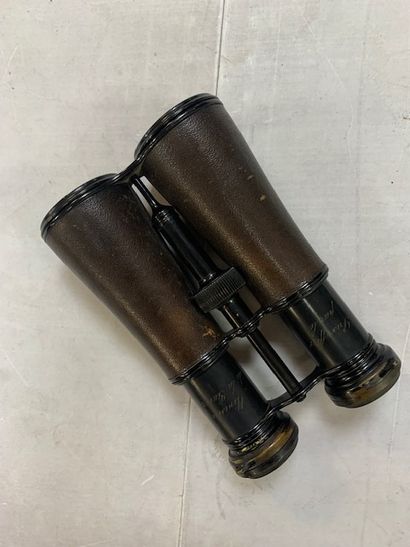 null Binoculars. A pair of Lemaire binoculars with, on one side, a sign "Prize offered...