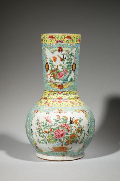 null Porcelain vase with long neck decorated with birds and butterflies on a floral...