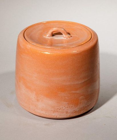 null Covered orange terracotta pot with white stylized decoration. Japan, Kobe, 20th...