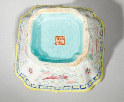 null Square bowl on pedestal with polychrome decoration with stylized floral design....