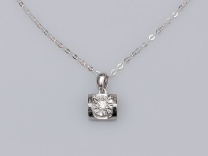 null 18K white gold chain and 18K white gold pendant set with a small diamond. 1.1...
