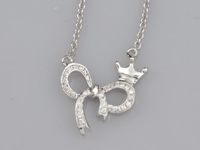 null Necklace in 750°/00 (18K) white gold with a knotted ribbon set with diamonds....