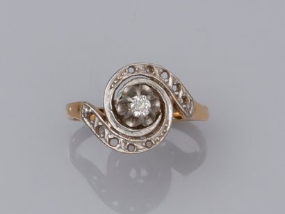 null Two-tone 750°/00 (18K) gold tourbillon ring, set with a small antique cut diamond,...