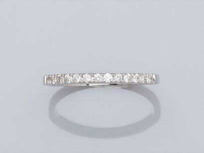 null Fine wedding band in 750°/00 (18K) white gold set with brilliant-cut diamonds...