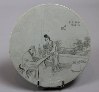 null Porcelain disc-shaped screen decorated with a maid in front of a scholar at...