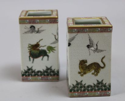 null A pair of square polychrome porcelain vases decorated with cranes and felines,...