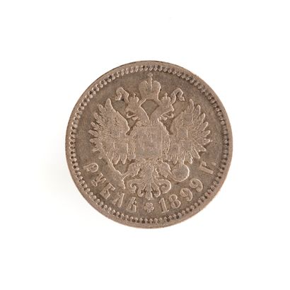 null Nicolas II. Pièce d'un rouble, en argent. 1899.

Diamètre 35 mm.

Poids : 19,8...
