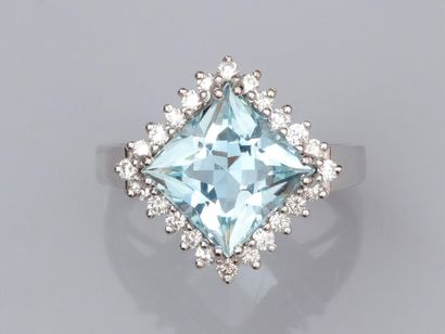 null Ring in 18K white gold, set with a square aquamarine weighing approximately...