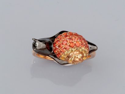 null Ring in 18K pink and patinated gold decorated with a snail set with yellow and...