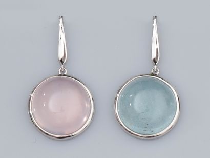 null Pair of earrings in 18K white gold, set with a rose quartz cabochon and an aquamarine...