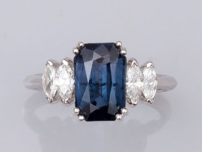 null Ring in 18K white gold, set with a natural Color change cushion sapphire of...