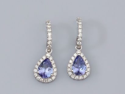 Pair of earrings in 18K white gold, set with...