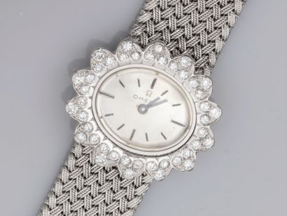 OMEGA, Ladies' watch in 750°/°° (18K) white...