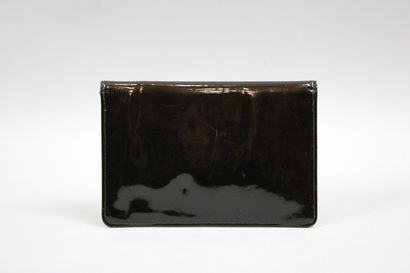 null Christian DIOR Made in France

Pochette enveloppe en cuir verni noir (petites...