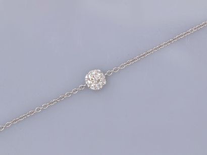  Fin bracelet en or en or gris 750°/°° (18K) , maille forçat serti d'un diamant taille...