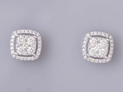 null Pair of cushion earrings in 18K white gold, set with brilliant-cut diamonds....