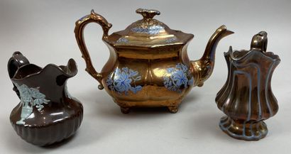 null Set composed of two pitchers and a coffee pot, with a glossy copper bottom,...