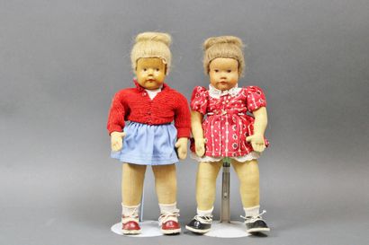 null KUCK in DIE WELT
Set of two German dolls, carved wooden heads, painted facial...