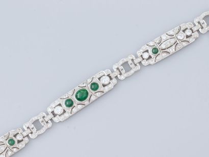 null Bracelet en platine repercé à décor géométrique serti de diamants taille ancienne...