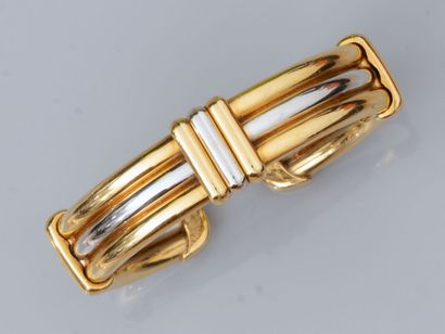 null O.J PERRIN, bracelet rigide ouvert en or deux tons 750°/°°(18K) , à trois bandeaux....