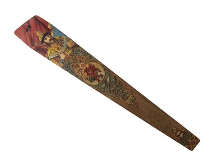 null Large paper-cutter, in pyrographed and painted wood (effigies and weapons),...