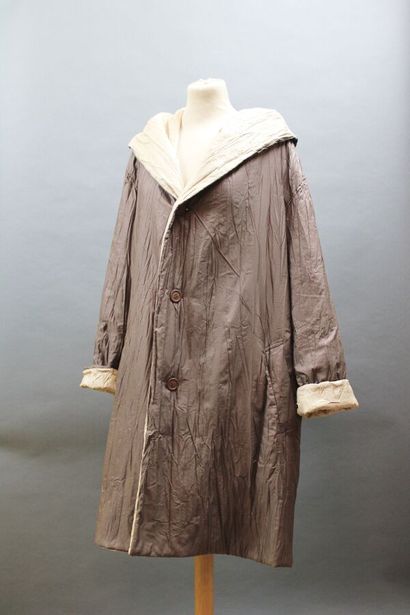 WINDCOAT (Issey Miyake)
Manteau à capuche...