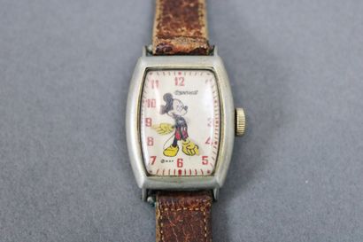 null INGERSOLL, circa 1835
Montre en acier, cadran à décor de Mickey, bras faisant...