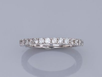 Diamond wedding band in 750°/°°(18K) white...