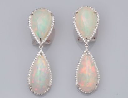 Pair of long earrings in 750°/°°(18K) white...