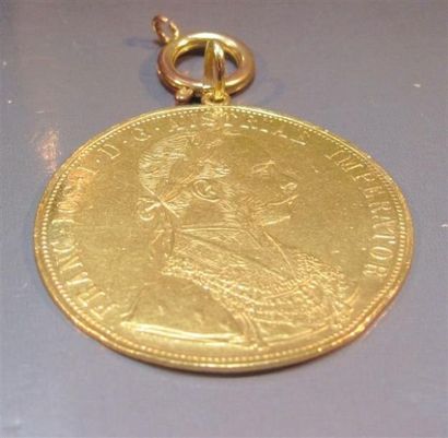 null Pièce de 20 ducats en or montée en pendentif. 14.90 g
