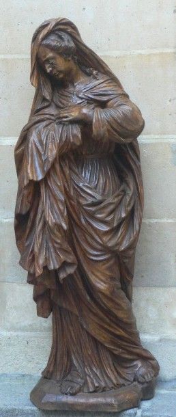 null Sainte ANNE en bois sculpté.

XVII siècle.

Hauteur 149 cm

