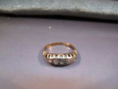 null Bague jarretière en or 19K sertie de diamants taille ancienne en ligne en chute....