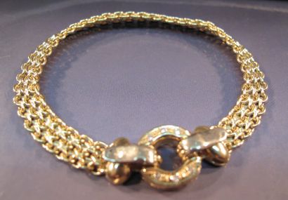 null Bracelet ruban en or jaune fermoir anneau serti de petits diamants. Poids: 12.40g....