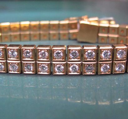 CHOPARD Bracelet souple en or jaune 750°/00 (hibou) serti de deux rangs de diamants...