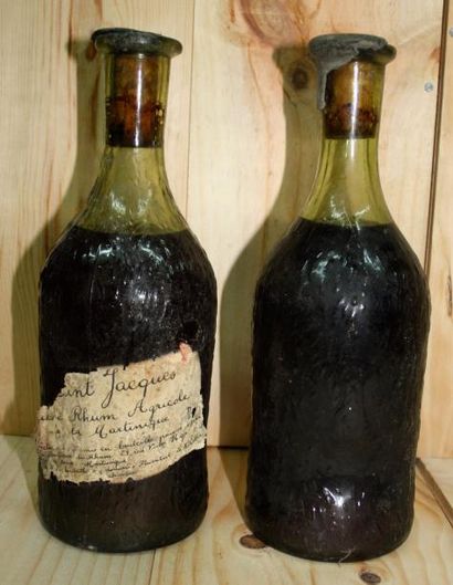 null 2 bouteilles RHUM St JACQUES, Vieu Rhum agricole de la Martinique Anc.
Une étiquette...