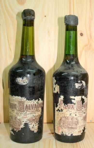 null 2 bouteilles CALVADOS "Vieille reserve" Pierre HUET 1893
Etiquettes déchirées,...