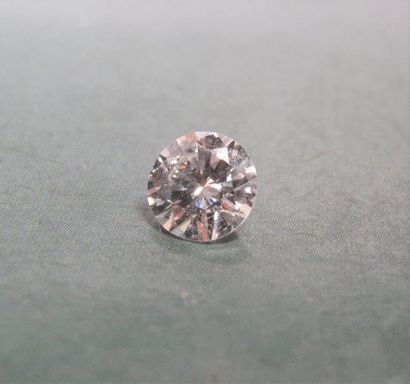  Diamant taille brillant de 0.79 carat. Avec sa monture 2g