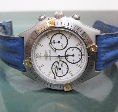 BREITLING Chronographe en acier et or, triple compteur, mouvement automatique. Bracelet...