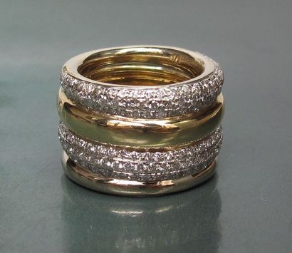 null POMELLATO Bague bandeau en or deux tons sertie de diamants. Signée et numérotée....