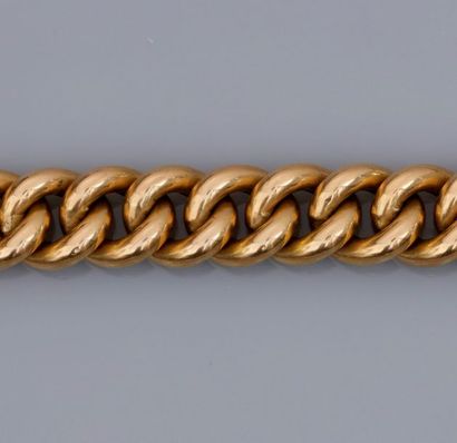 null Bracelet en or jaune 750°/00, maille gourmette. 25 g. L : 18 cm. H : 10 mm