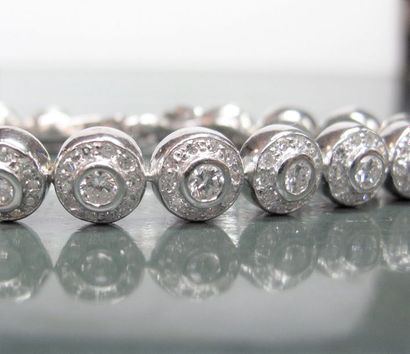 null Bracelet souple en or 750°/00 (18K) serti de diamants taille brillant et 8/8...