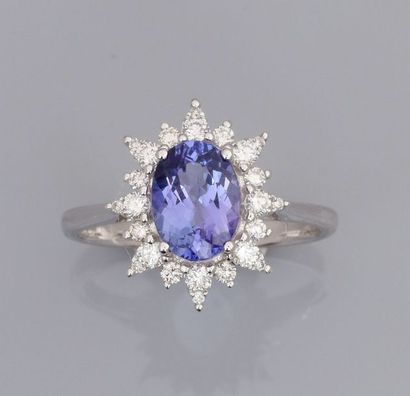 null Bague en or gris 750°/00 (18 K), sertie d 'une tanzanite ovale de 1.20 carat...