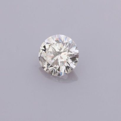   Bague en or 750°/00, sertie d 'un diamant taille brillant de 1.26 carat, couleur...