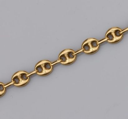   Bracelet en or jaune 750°/00 (18K), maille grain de café. 7.50 g. L : 20 cm. H...