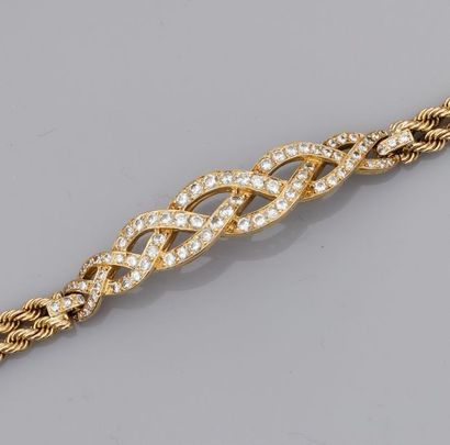   Bracelet en or jaune 750°/00 (18K), à double rang de maille corde et motif de tresse...