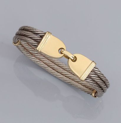   Bracelet ovale rigide en fils d'acier, barrettes et fermoir en or jaune 750°/00...