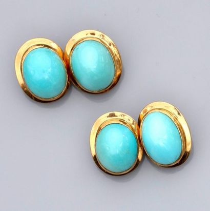   Paire de boutons de manchettes en or jaune 750°/00 (18K), sertis de cabochons de...