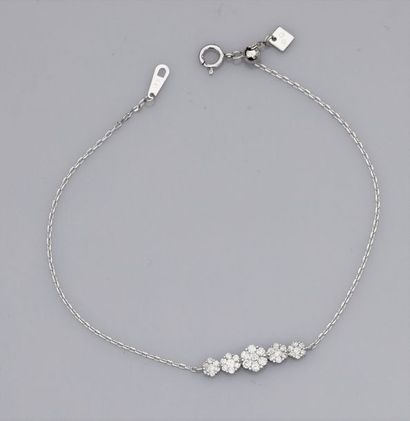   Fin bracelet en or gris 750°/00 (18K), maille forçat, serti de diamants taille...