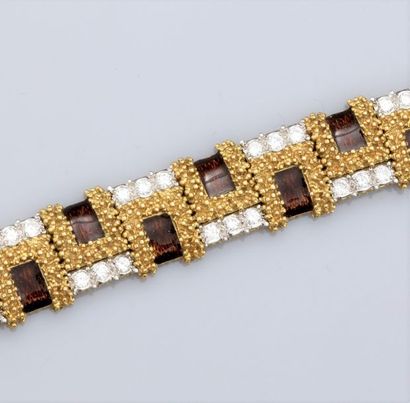 FRED FRED, rare bracelet Vintage en or 750°/00 (18K)et platine à maillons articulés...