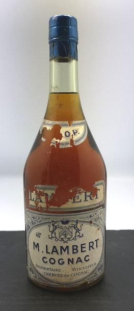 null Un flacon 70cl COGNAC V.S.O.P - M. LAMBERT Etiquette tachée et abimée.